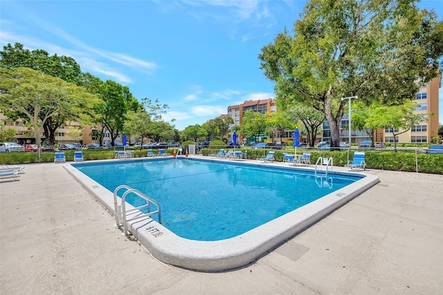 7080 Environ Blvd Unit 223, Lauderhill, FL 33319 - community pool featuring a patio area