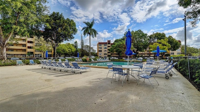 7080 Environ Blvd Unit 223, Lauderhill, FL 33319 - community pool with a patio area and fence