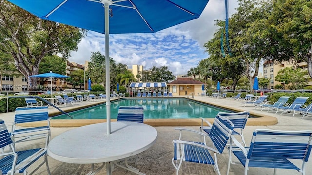 7080 Environ Blvd Unit 223, Lauderhill, FL 33319 - community pool featuring a patio