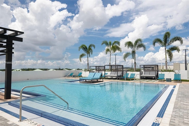 community pool featuring fence