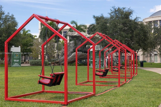 communal playground featuring a lawn