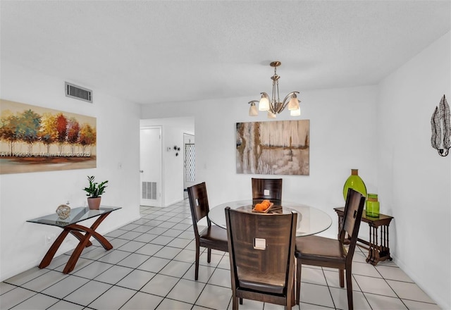 10451 Sunrise Lakes Blvd Unit 205, Sunrise, FL 33322 - dining room featuring a chandelier and light tile patterned floors