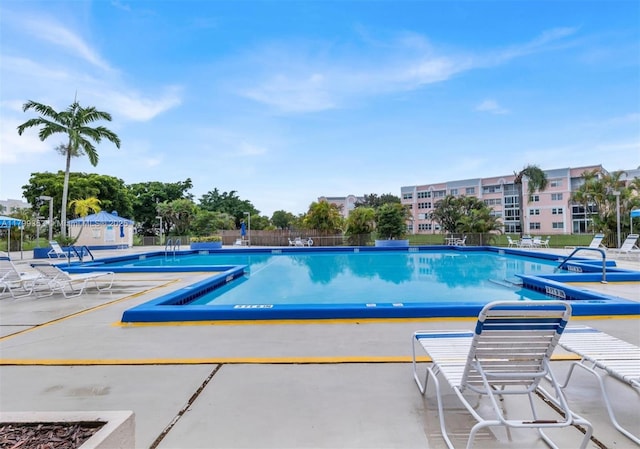 10451 Sunrise Lakes Blvd Unit 205, Sunrise, FL 33322 - community pool with a patio