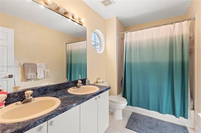 full bath featuring tile patterned floors, double vanity, toilet, and shower / tub combo with curtain