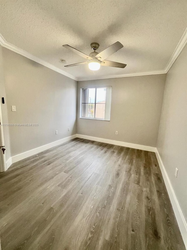 15711 SW 137th Ave Unit 201, Miami, FL 33177 - unfurnished room with a textured ceiling, dark wood-style floors, ceiling fan, crown molding, and baseboards
