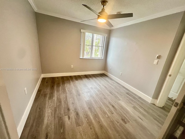 15711 SW 137th Ave Unit 201, Miami, FL 33177 - spare room featuring ornamental molding, wood finished floors, baseboards, a ceiling fan, and a textured ceiling