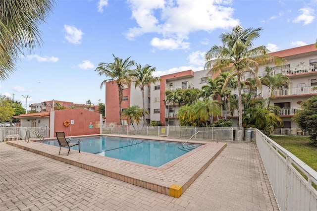 8401 NW 8th St Unit 401, Miami, FL 33126 - community pool with fence and a patio