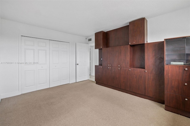 8401 NW 8th St Unit 401, Miami, FL 33126 - unfurnished bedroom with light colored carpet and a closet