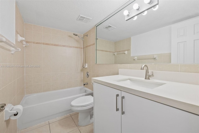 8401 NW 8th St Unit 401, Miami, FL 33126 - full bath featuring tile patterned floors, washtub / shower combination, toilet, tile walls, and vanity