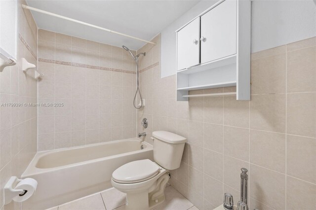 8401 NW 8th St Unit 401, Miami, FL 33126 - bathroom with tile walls, toilet, and  shower combination