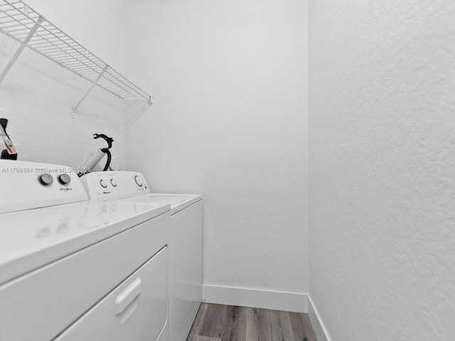 2482 SE 14th Ct, Homestead, FL 33035 - clothes washing area with washing machine and dryer, baseboards, and dark wood finished floors