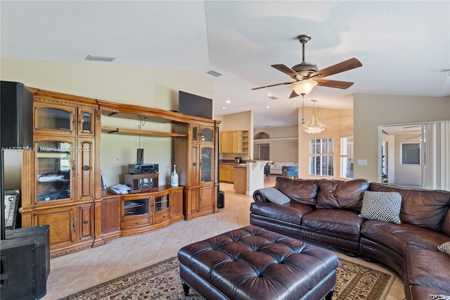 5514 NW W Lundy Cir, Port St Lucie, FL 34986 - living area featuring a ceiling fan, lofted ceiling, and light tile patterned floors