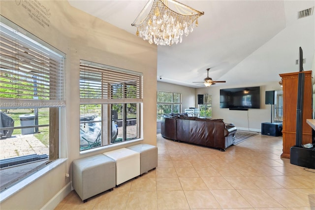 5514 NW W Lundy Cir, Port St Lucie, FL 34986 - living room featuring light tile patterned floors, high vaulted ceiling, a chandelier, baseboards, and ceiling fan