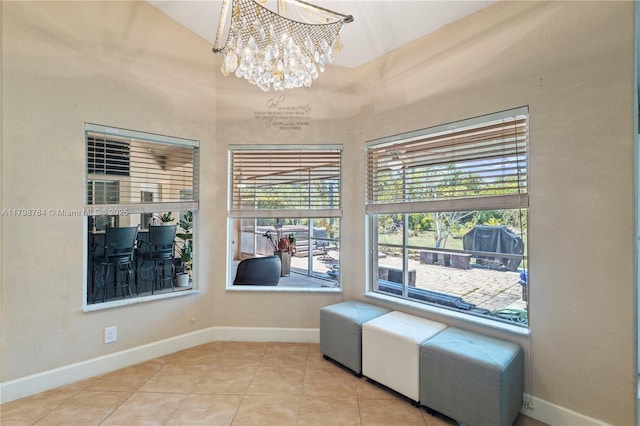 5514 NW W Lundy Cir, Port St Lucie, FL 34986 - living area featuring a chandelier, healthy amount of natural light, and baseboards