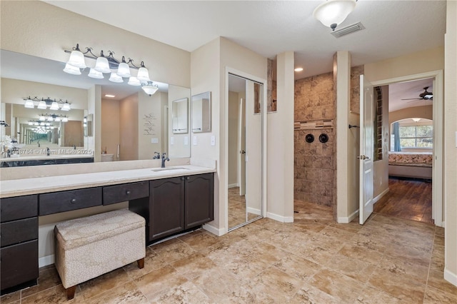 5514 NW W Lundy Cir, Port St Lucie, FL 34986 - ensuite bathroom with walk in shower, a ceiling fan, and vanity