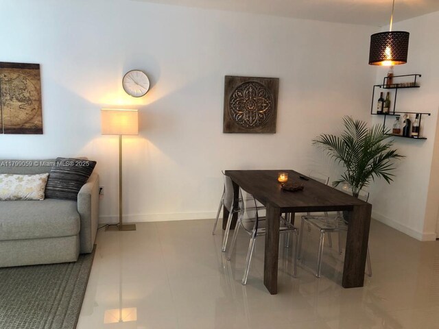 488 NE 18th St Unit 2802, Miami, FL 33132 - tiled dining area with baseboards