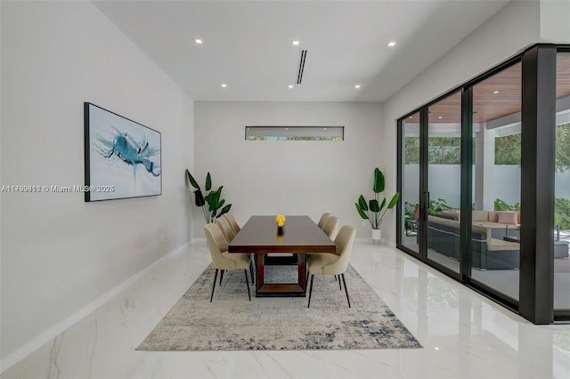 1780 Chucunantah Rd, Miami, FL 33133 - dining room with marble tiled floors, recessed lighting, baseboards, and french doors