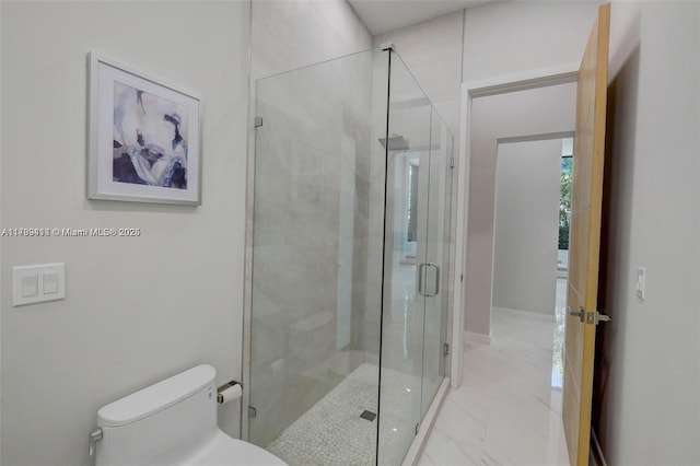 1780 Chucunantah Rd, Miami, FL 33133 - full bathroom with marble finish floors, toilet, and a stall shower