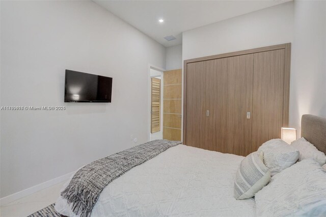 1780 Chucunantah Rd, Miami, FL 33133 - bedroom with a closet and baseboards
