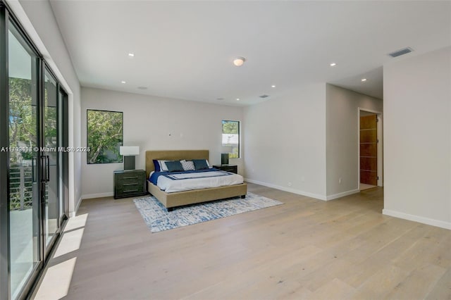 1780 Chucunantah Rd, Miami, FL 33133 - bedroom featuring light wood finished floors, baseboards, access to outside, and recessed lighting