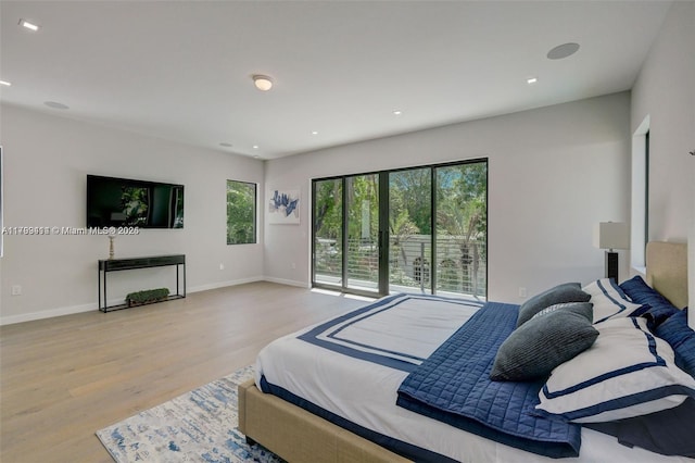 1780 Chucunantah Rd, Miami, FL 33133 - bedroom featuring wood finished floors, access to exterior, recessed lighting, and baseboards