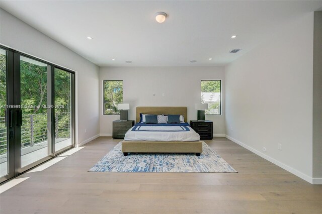 1780 Chucunantah Rd, Miami, FL 33133 - bedroom with access to outside, baseboards, light wood-style flooring, and recessed lighting