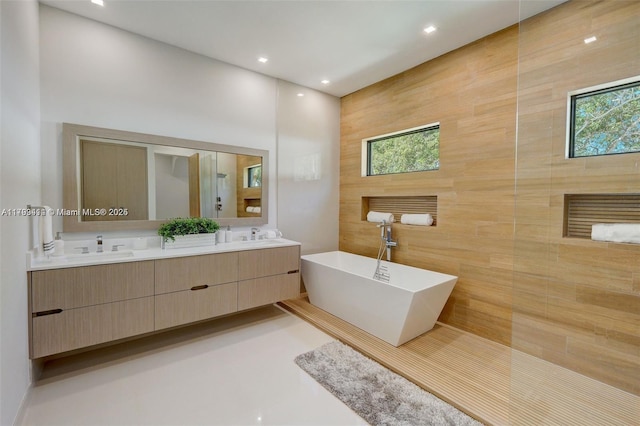 1780 Chucunantah Rd, Miami, FL 33133 - full bathroom with a soaking tub, double vanity, and recessed lighting