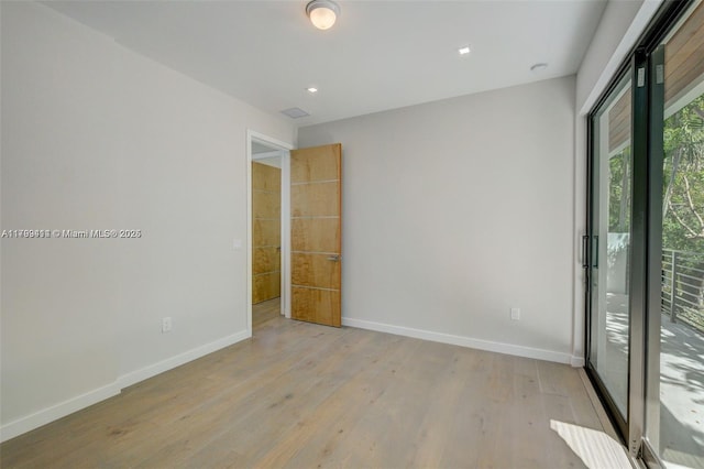 1780 Chucunantah Rd, Miami, FL 33133 - empty room with baseboards, light wood finished floors, and recessed lighting