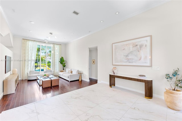 living room featuring crown molding, baseboards, marble look tiles, and recessed lighting