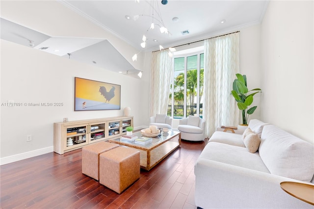 living area with crown molding, dark wood-style floors, and baseboards