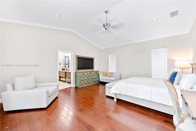 bedroom featuring lofted ceiling, crown molding, wood finished floors, ceiling fan, and baseboards