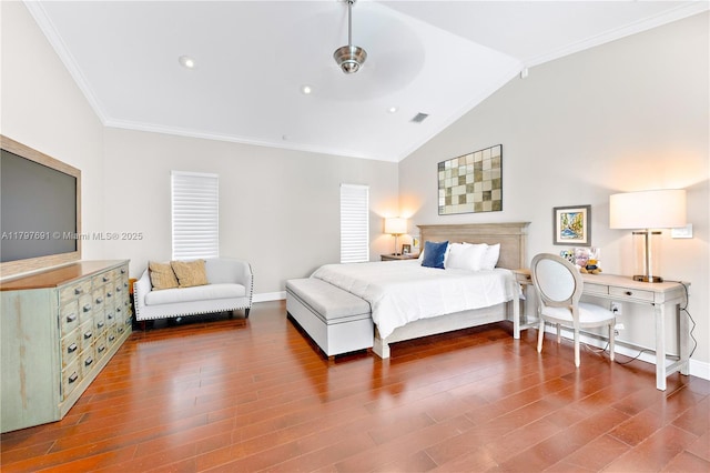 bedroom featuring vaulted ceiling, crown molding, wood finished floors, baseboards, and recessed lighting