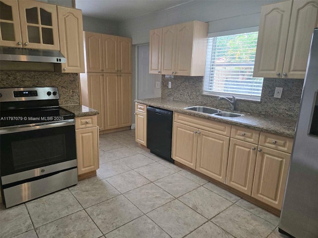 7917 Juniper St, Miramar, FL 33023 - kitchen with appliances with stainless steel finishes, a sink, under cabinet range hood, light brown cabinets, and decorative backsplash
