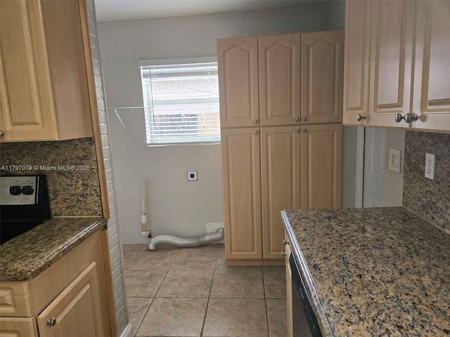 7917 Juniper St, Miramar, FL 33023 - kitchen with decorative backsplash, light brown cabinets, and dark stone counters