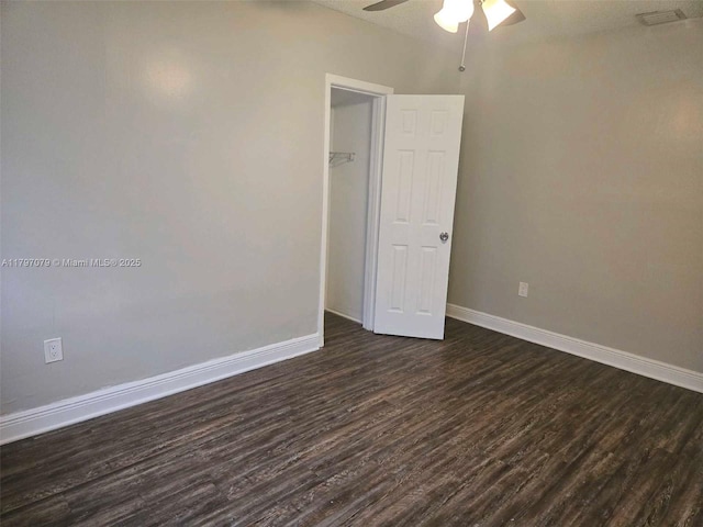 7917 Juniper St, Miramar, FL 33023 - unfurnished room with dark wood-style floors, ceiling fan, and baseboards