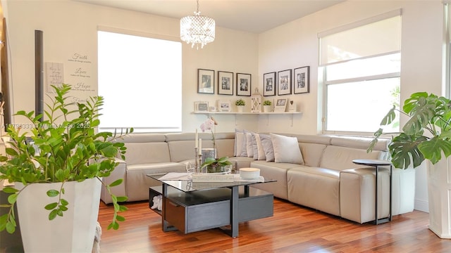 1374 NW 159th Ave, Pembroke Pines, FL 33028 - sitting room featuring wood finished floors and a chandelier