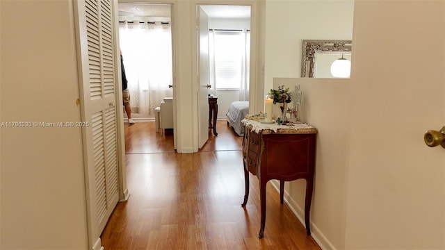 1374 NW 159th Ave, Pembroke Pines, FL 33028 - corridor with healthy amount of natural light, wood finished floors, and baseboards