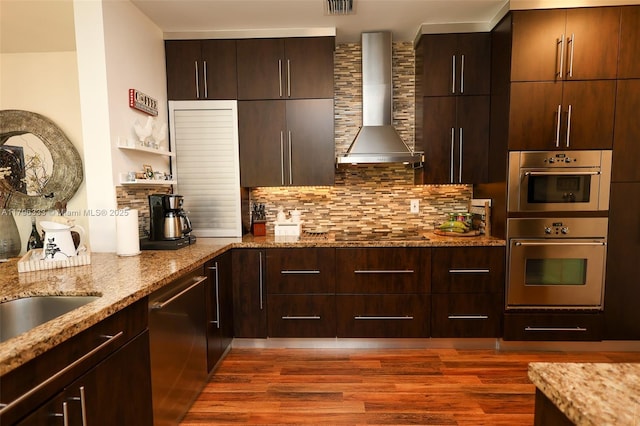 1374 NW 159th Ave, Pembroke Pines, FL 33028 - kitchen with wall chimney range hood, stainless steel appliances, dark wood-style flooring, and decorative backsplash