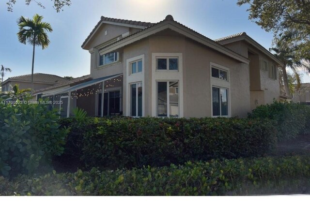 15899 SW 12th St, Pembroke Pines, FL 33027 - view of property exterior featuring stucco siding