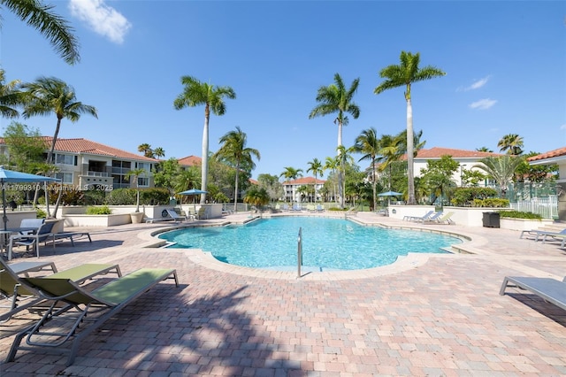 11643 W Atlantic Blvd Unit 1101, Coral Springs, FL 33071 - community pool with a patio and fence