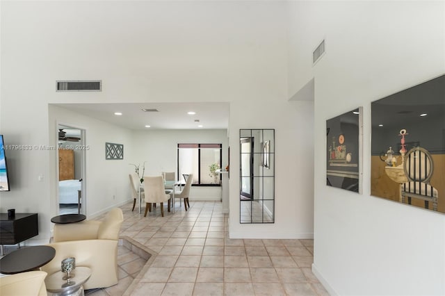 3620 E Forge Rd Unit 16, Davie, FL 33328 - living room with light tile patterned floors, a high ceiling, and recessed lighting