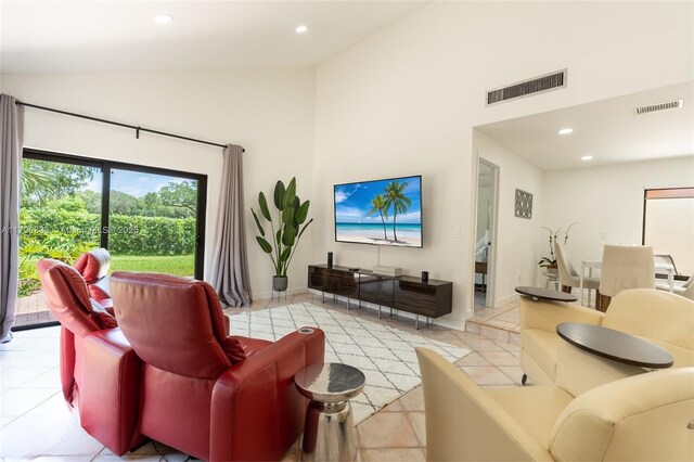 3620 E Forge Rd Unit 16, Davie, FL 33328 - living room with high vaulted ceiling, recessed lighting, and light tile patterned flooring