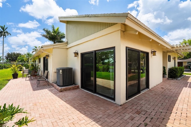 3620 E Forge Rd Unit 16, Davie, FL 33328 - back of house with a patio, stucco siding, and a pergola