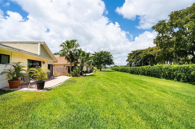 3620 E Forge Rd Unit 16, Davie, FL 33328 - view of grassy yard featuring a patio area