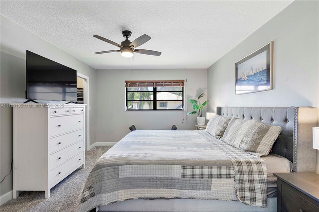 1779 NE 39th Ct Unit 1107, Pompano Beach, FL 33064 - carpeted bedroom with a textured ceiling and ceiling fan