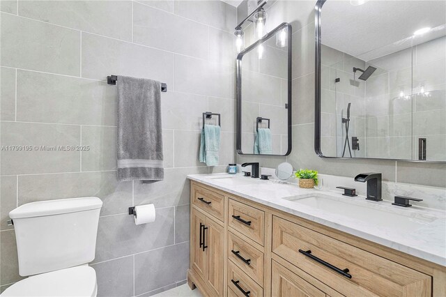 1779 NE 39th Ct Unit 1107, Pompano Beach, FL 33064 - bedroom with light colored carpet, baseboards, ensuite bathroom, ceiling fan, and a textured ceiling