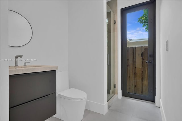 30 NE 50th St, Miami, FL 33137 - bathroom featuring vanity, a shower stall, toilet, and baseboards