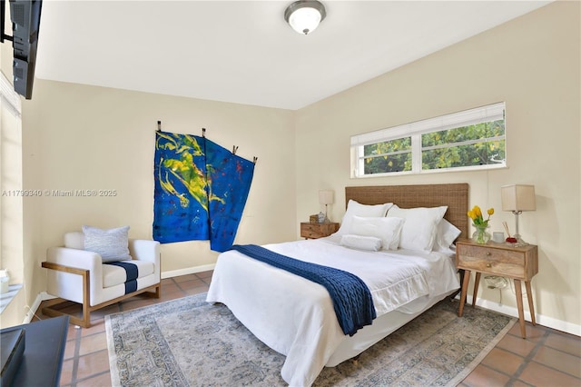 tiled bedroom with baseboards