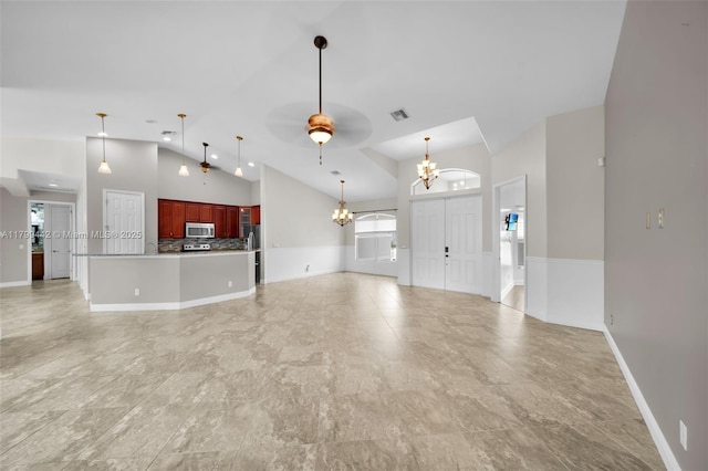 3326 SW 8th St, Cape Coral, FL 33991 - unfurnished living room featuring a chandelier, a ceiling fan, high vaulted ceiling, and baseboards