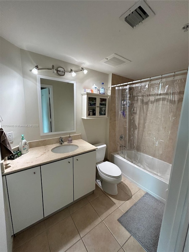 full bathroom with tile patterned floors, shower / bath combo, toilet, and vanity